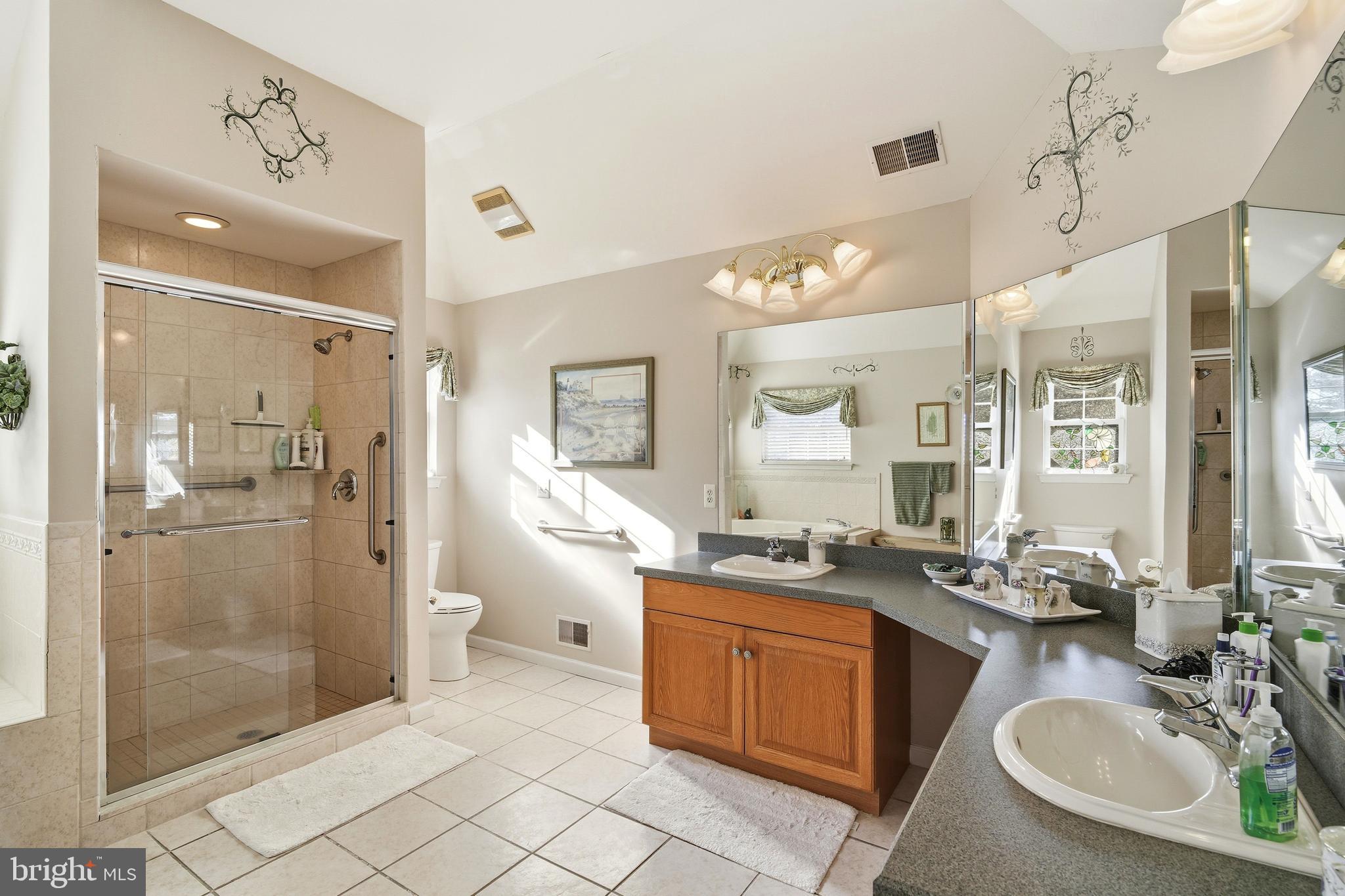 27 Rodeo Drive West Creek, NJ 08092 - Photo 37 of 52 a bathroom with a granite countertop sink mirror and shower