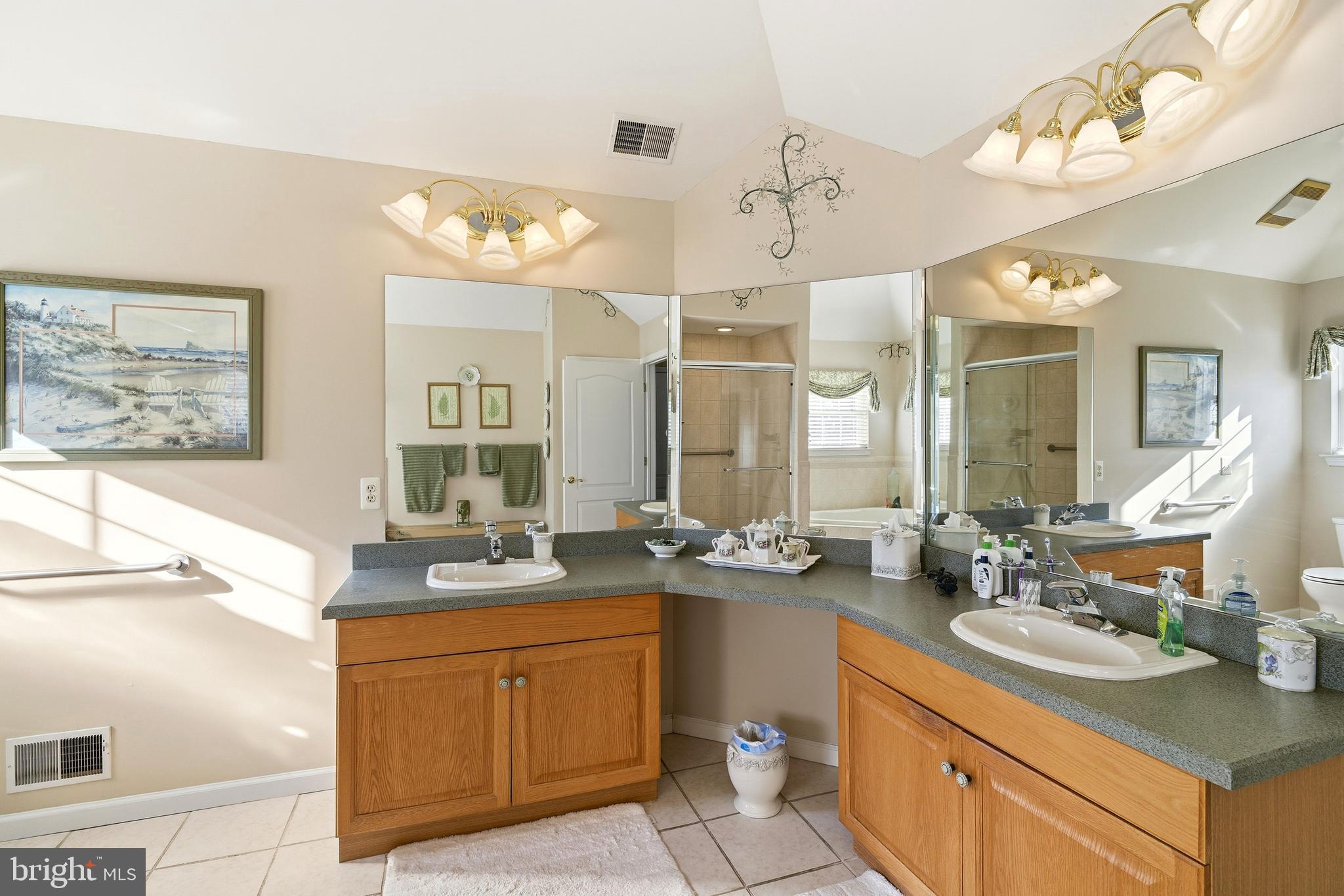 27 Rodeo Drive West Creek, NJ 08092 - Photo 39 of 52 a bathroom with a sink double vanity and a mirror