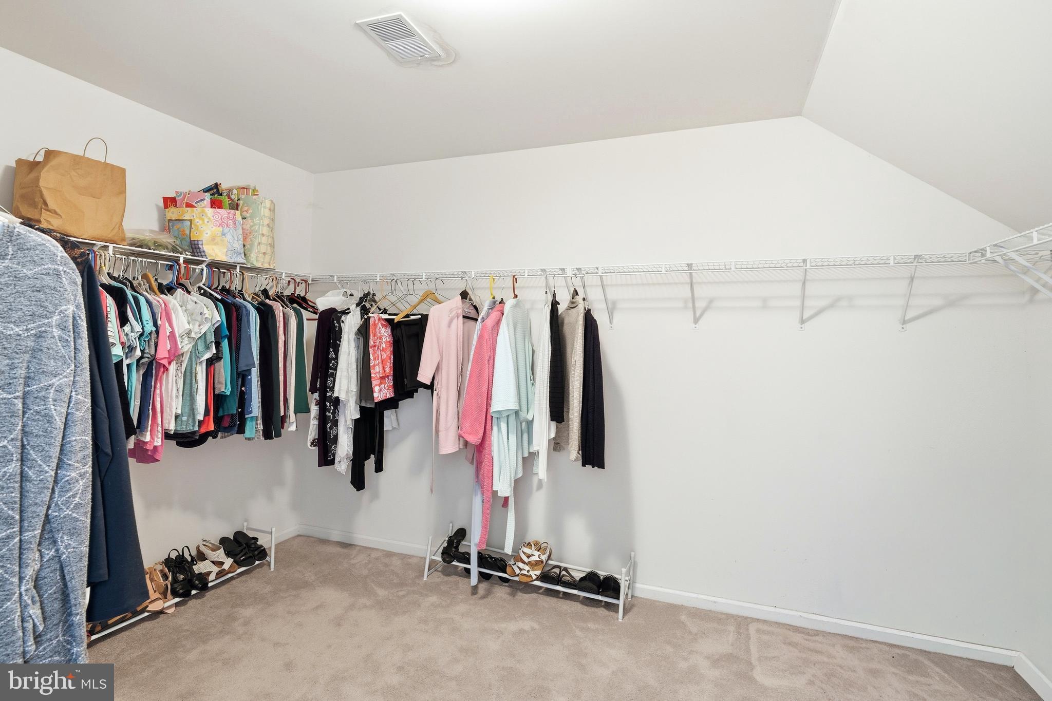 27 Rodeo Drive West Creek, NJ 08092 - Photo 40 of 52 a view of walk in closet with clothes