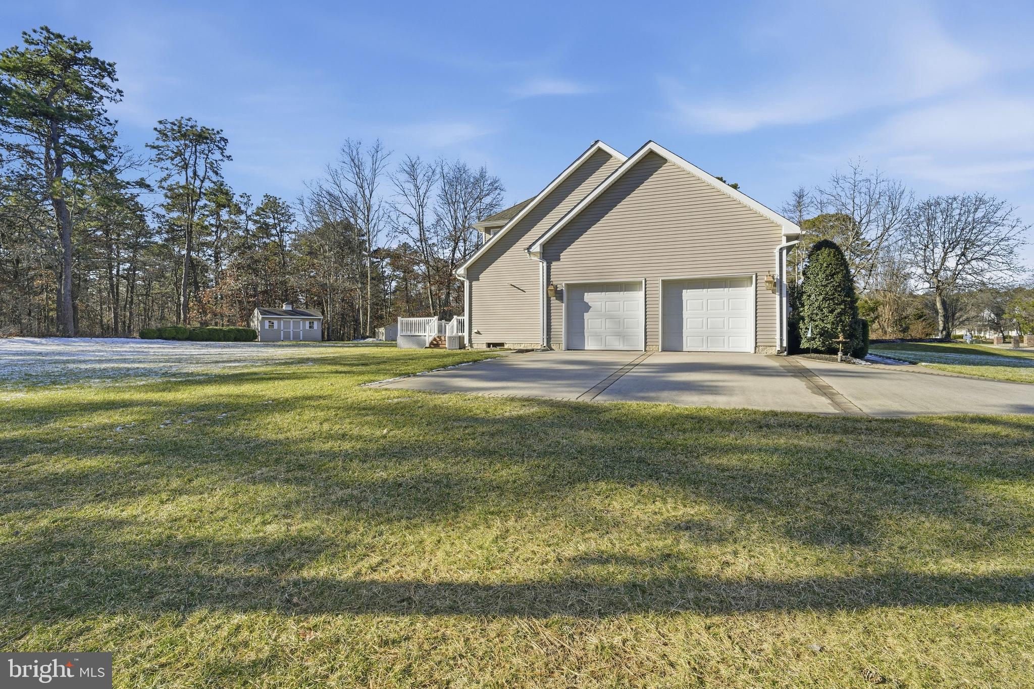 27 Rodeo Drive West Creek, NJ 08092 - Photo 4 of 52 a view of a house with a yard and swimming pool