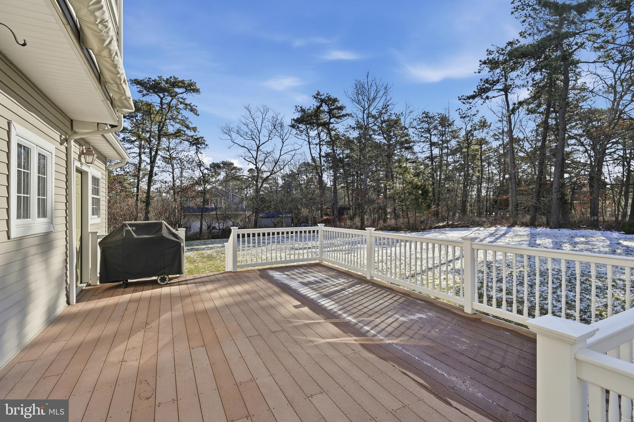 27 Rodeo Drive West Creek, NJ 08092 - Photo 49 of 52 a view of terrace with wooden floor and fence