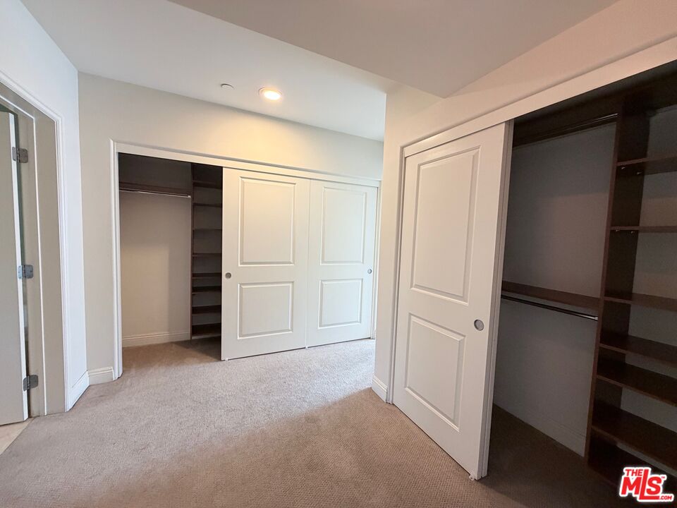 8238 West Manchester Avenue, Unit 308 Playa del Rey, CA 90293 - Photo 8 of 19 a view of empty room with closet and electronic appliances