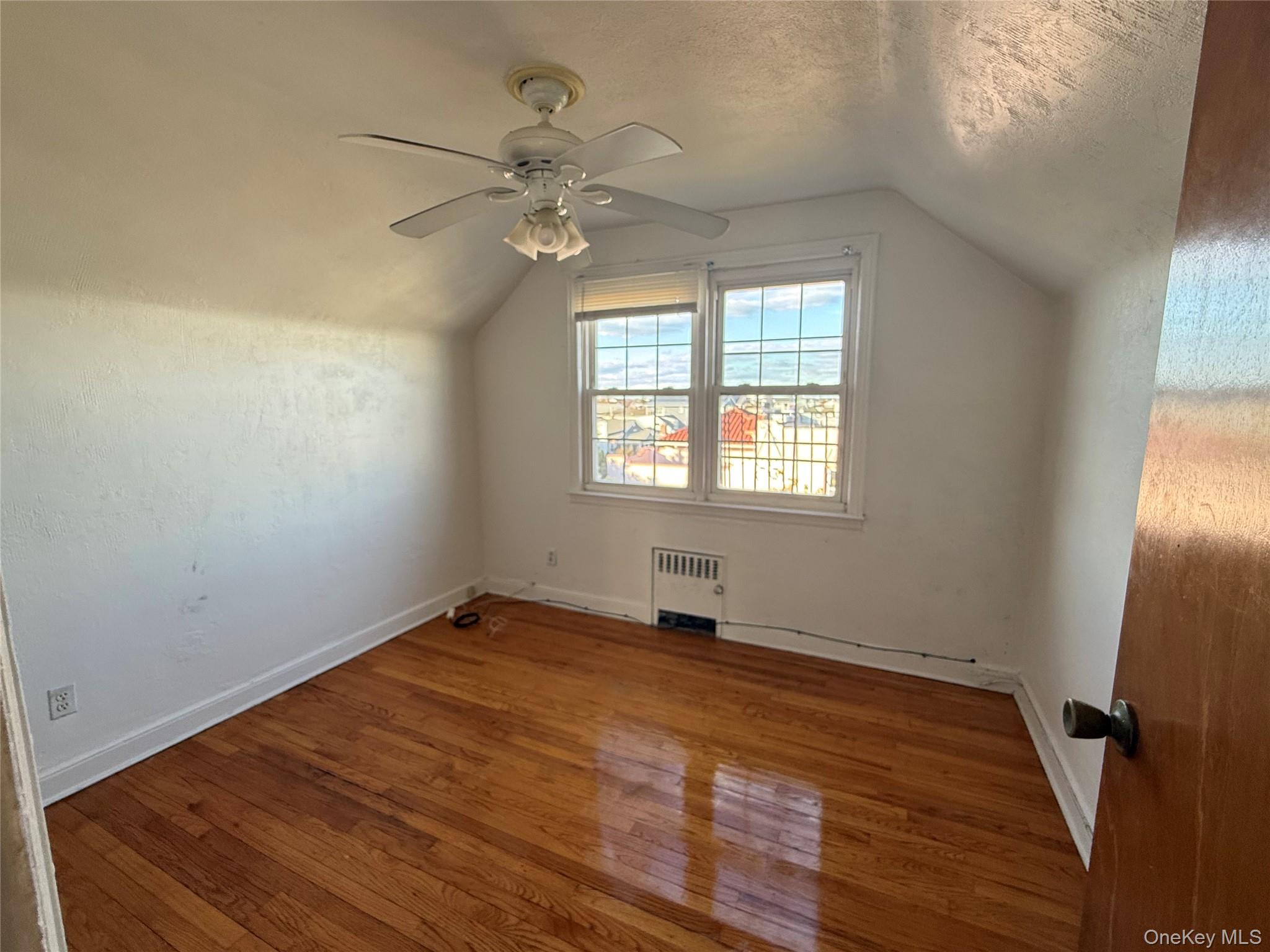 801 East Broadway, Unit F Long Beach, NY 11561 - Photo 8 of 11 a view of an empty room with a window