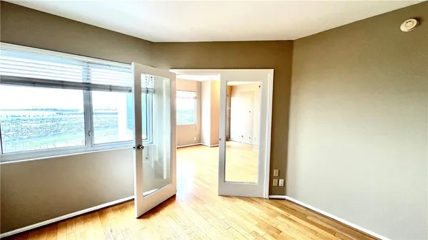 a view of an empty room and window