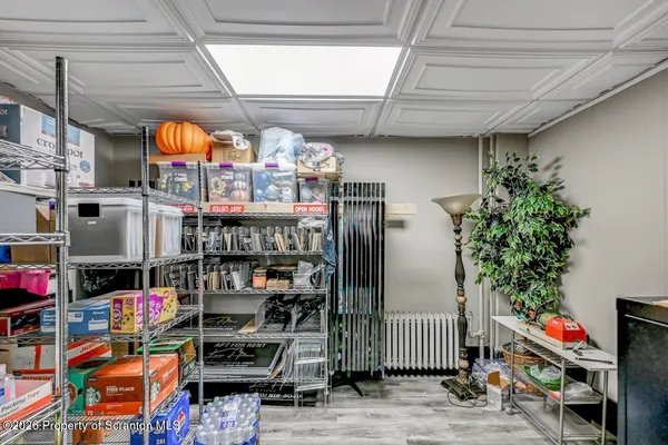a living room with lots of furniture and toys