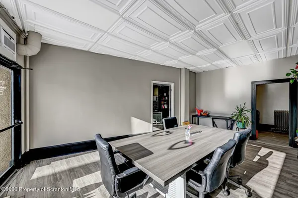 a bed room with a bed and a television