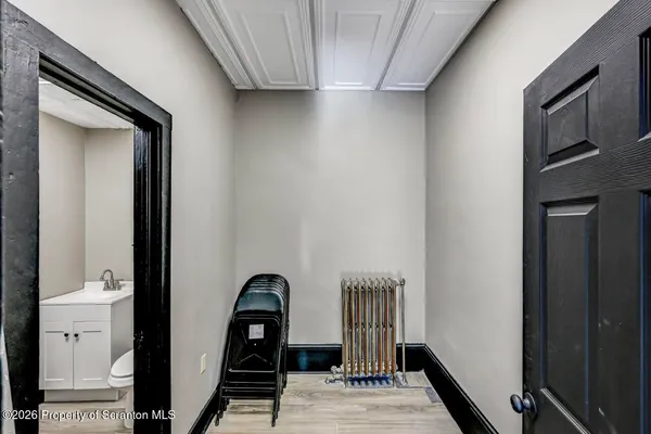 a kitchen that has a sink and a stove in it