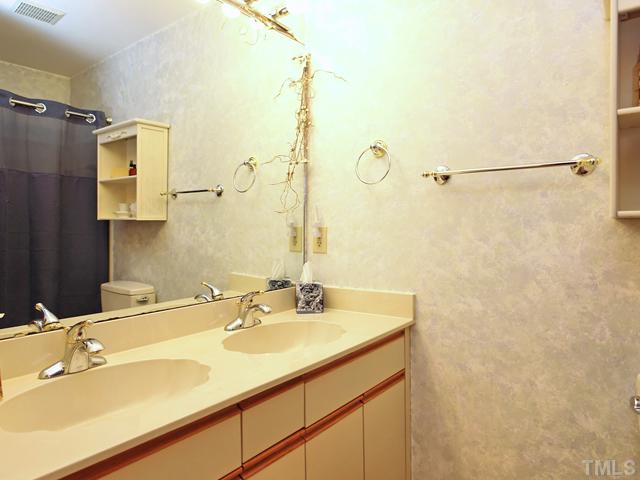 12333 Whartons Way Raleigh, NC 27613 - Photo 21 of 25 Upstairs Hall Bath