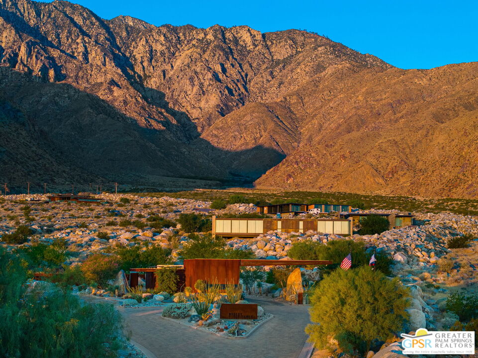 2405 Rising Sun Court Palm Springs, CA 92262 - Photo 6 of 14 an aerial view of a house with a mountain view
