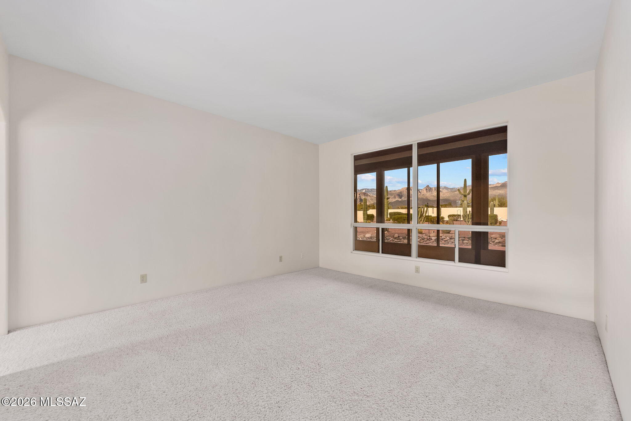 3655 North Harrison Road Tucson, AZ 85749 - Photo 13 of 51 an empty room with a large window
