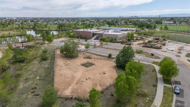 an aerial view of a house with outdoor space