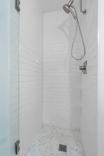 a bathroom with a glass shower