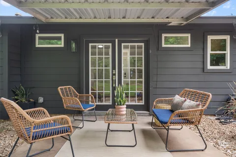 a building outdoor space with patio furniture