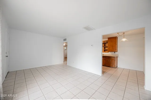 a view of a kitchen with a sink and an oven