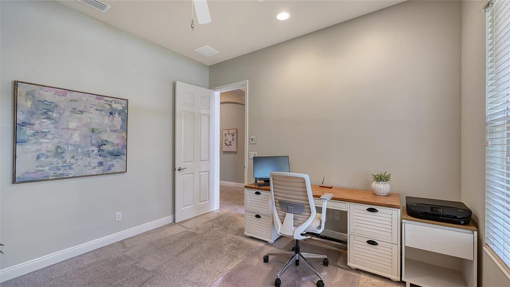 14718 Secret Harbor Place Lakewood Ranch, FL 34202 - Photo 38 of 73 a view of workspace with cabinets