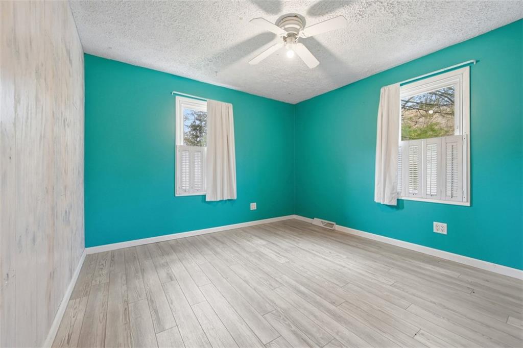 192 Yellow Creek Road Harmony, PA 16037 - Photo 21 of 41 a view of empty room with window and fan