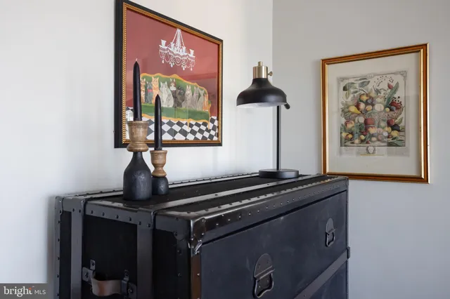 a room with furniture and wall painting