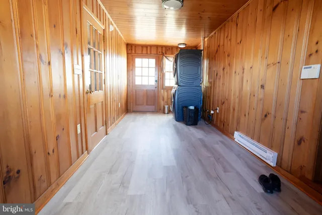 a view of a entryway with wooden floor