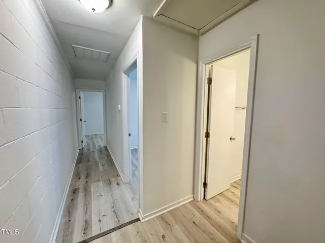 a view of livingroom with wooden floor