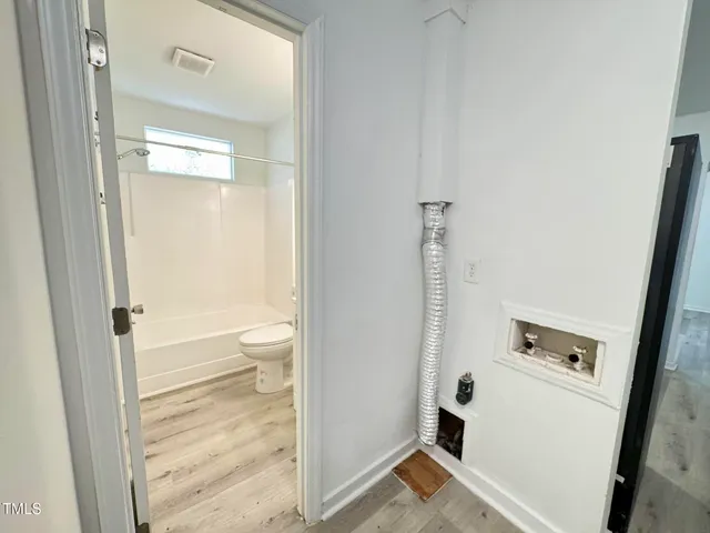 a bathroom with a sink and a shower