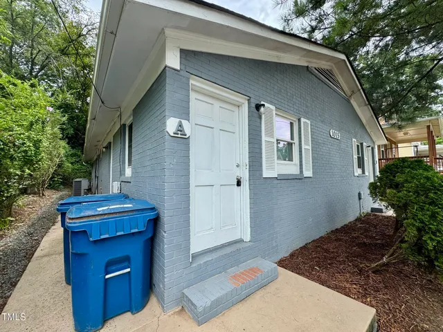 a front view of a house with outdoor space