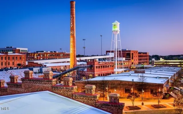 a view of a water fountain and an ocean