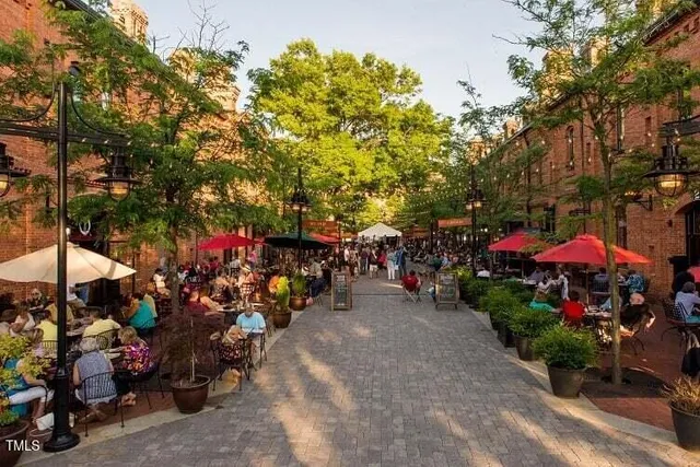 an outdoor space with lots of fruit and vegetables