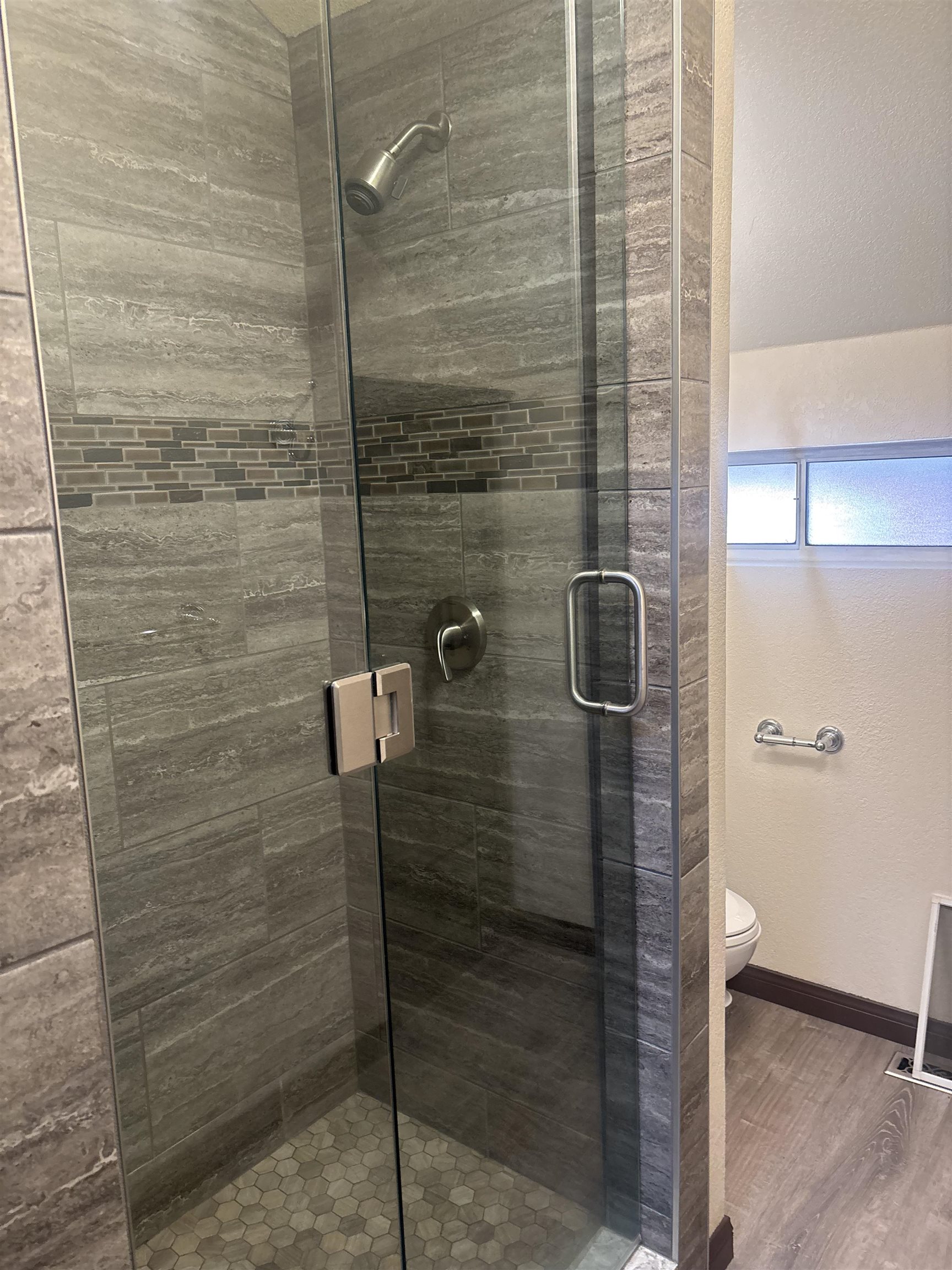 129 Sunny Slopes Road Mammoth Lakes, CA 93546 - Photo 15 of 16 Full bath featuring a stall shower, light wood-style floors, and a textured wall