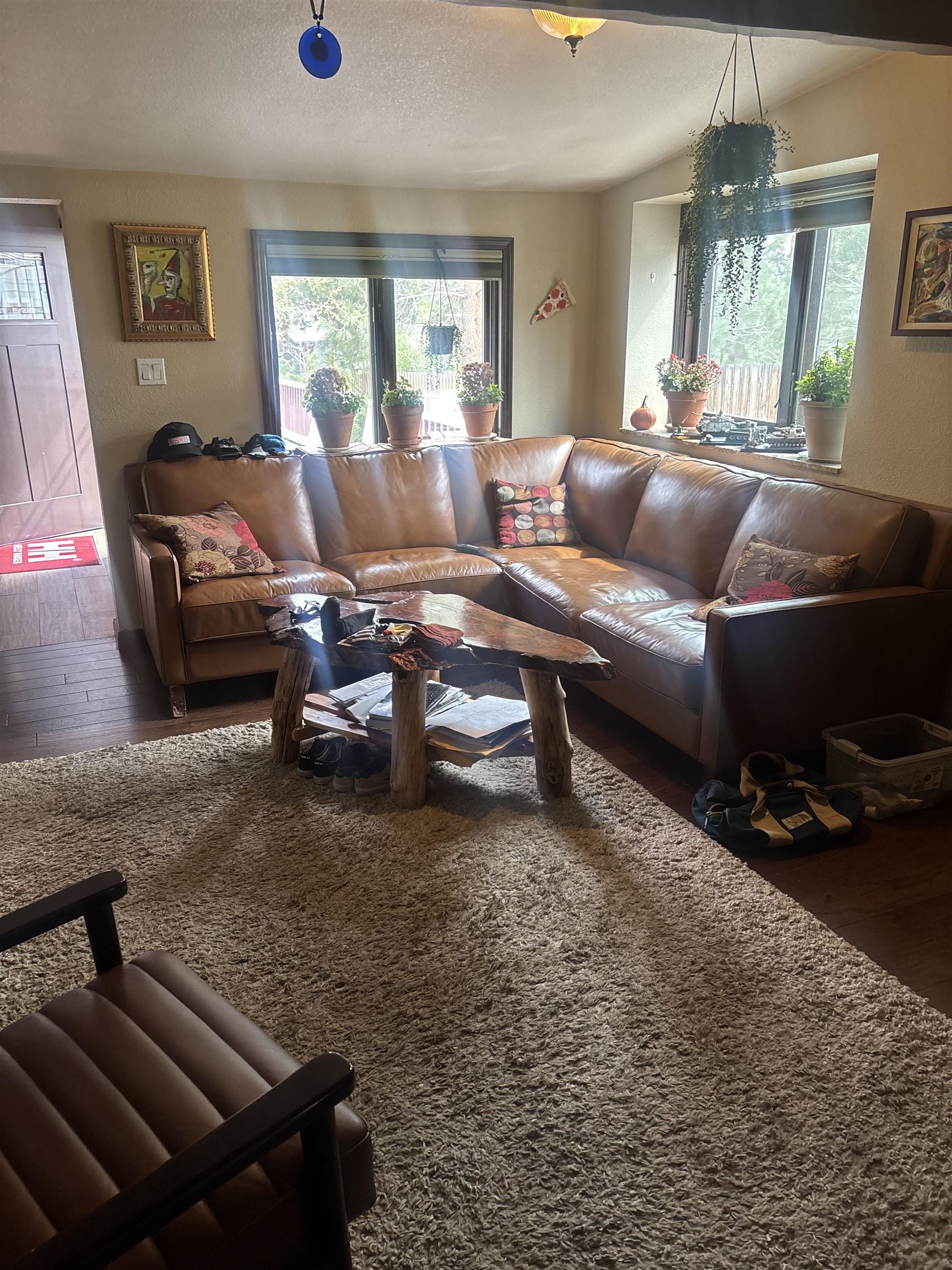129 Sunny Slopes Road Mammoth Lakes, CA 93546 - Photo 4 of 16 Living area featuring hardwood / wood-style flooring, plenty of natural light, and a textured ceiling