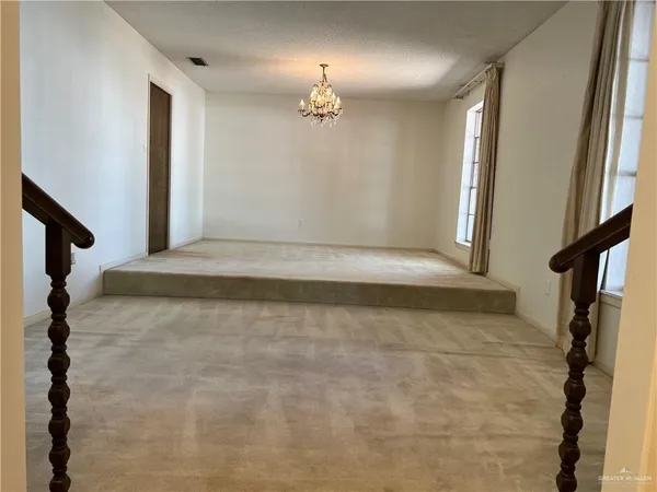 a view of entryway with a front door