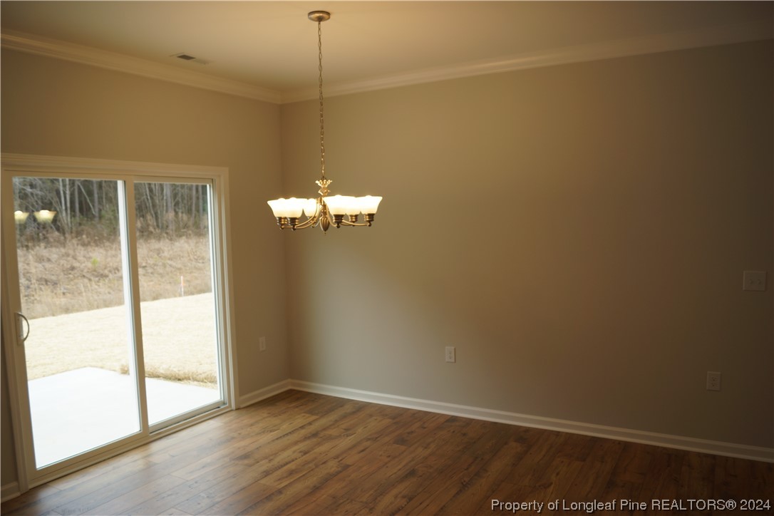 88 Knotts Berry Road Bunnlevel, NC 28323 - Photo 15 of 33 an empty room with a window