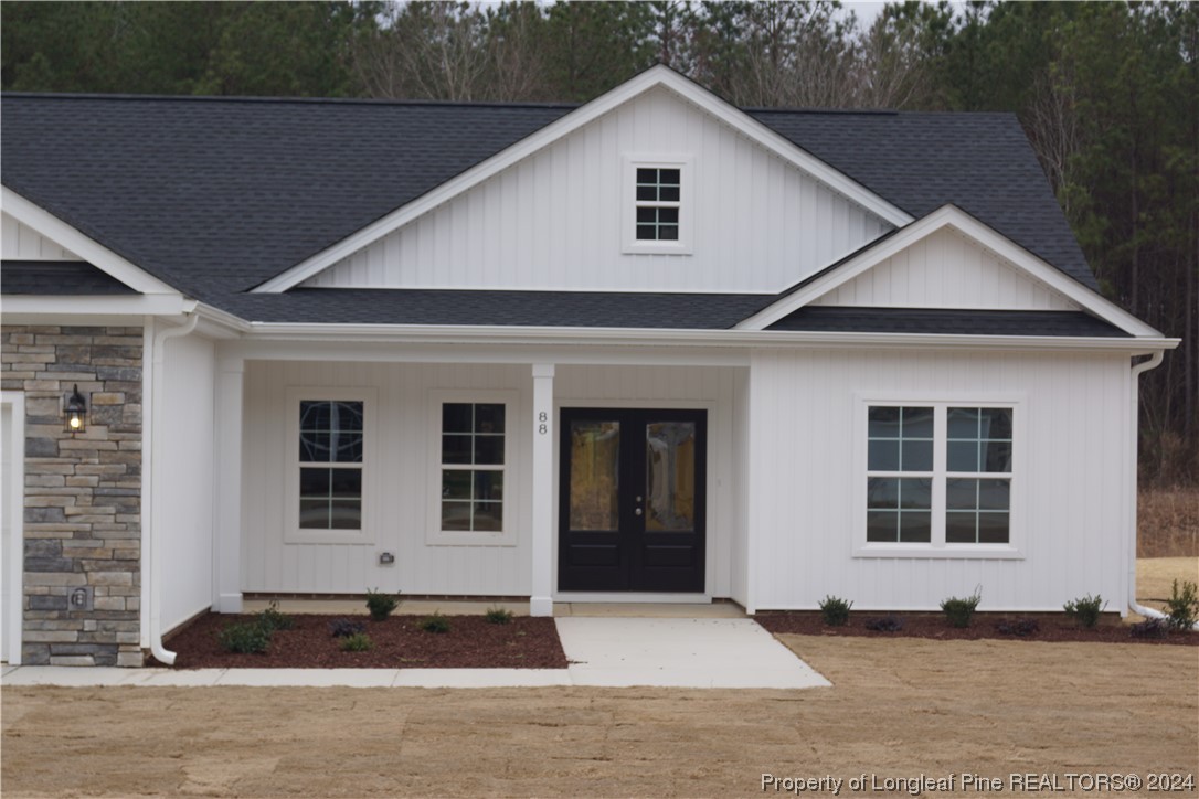 88 Knotts Berry Road Bunnlevel, NC 28323 - Photo 2 of 33 a front view of a house with a yard