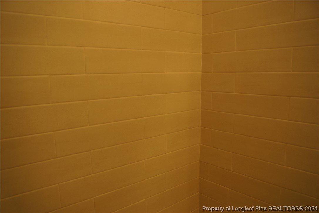 88 Knotts Berry Road Bunnlevel, NC 28323 - Photo 23 of 33 a bathroom with a shower