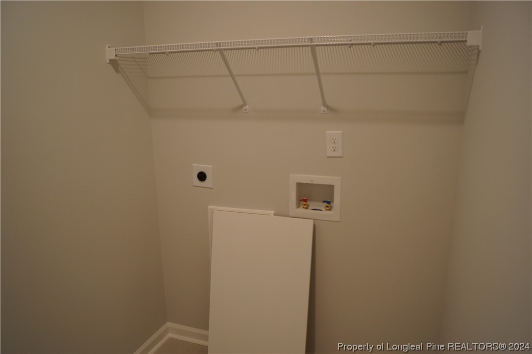 88 Knotts Berry Road Bunnlevel, NC 28323 - Photo 24 of 33 a view of storage room