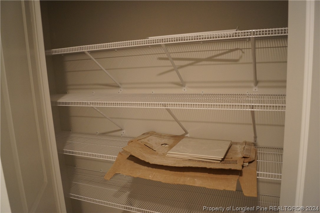 88 Knotts Berry Road Bunnlevel, NC 28323 - Photo 25 of 33 a bathroom with a shower