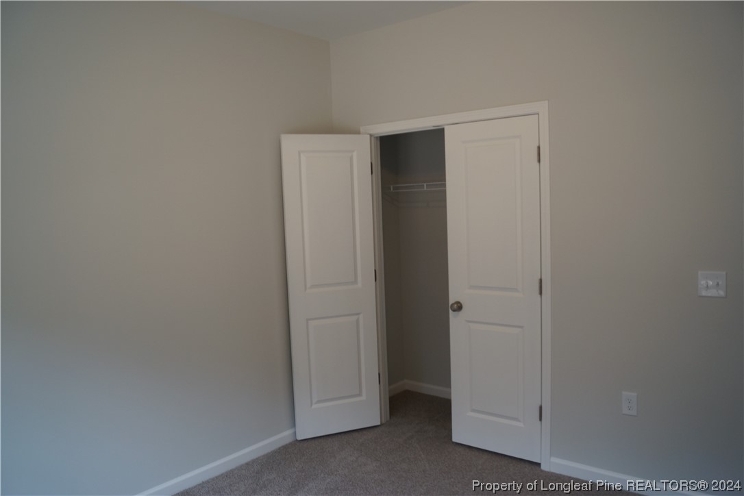 88 Knotts Berry Road Bunnlevel, NC 28323 - Photo 31 of 33 a view of an empty room