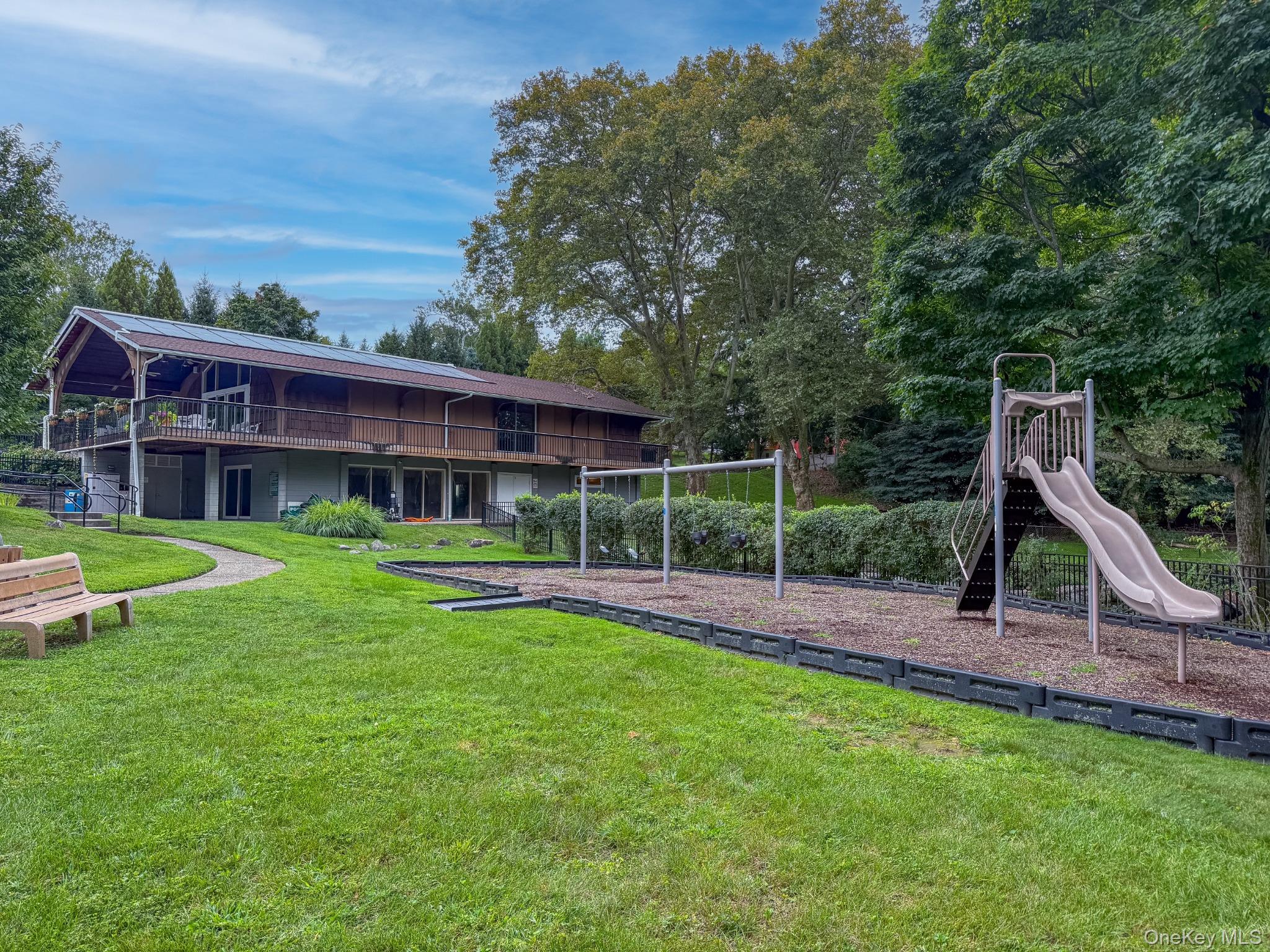 53 Tarryhill Road Tarrytown, NY 10591 - Photo 34 of 35 One of Tarryhill's two playgrounds provides another inviting outdoor recreation space, adding to the variety of amenities residents can enjoy throughout the community.
