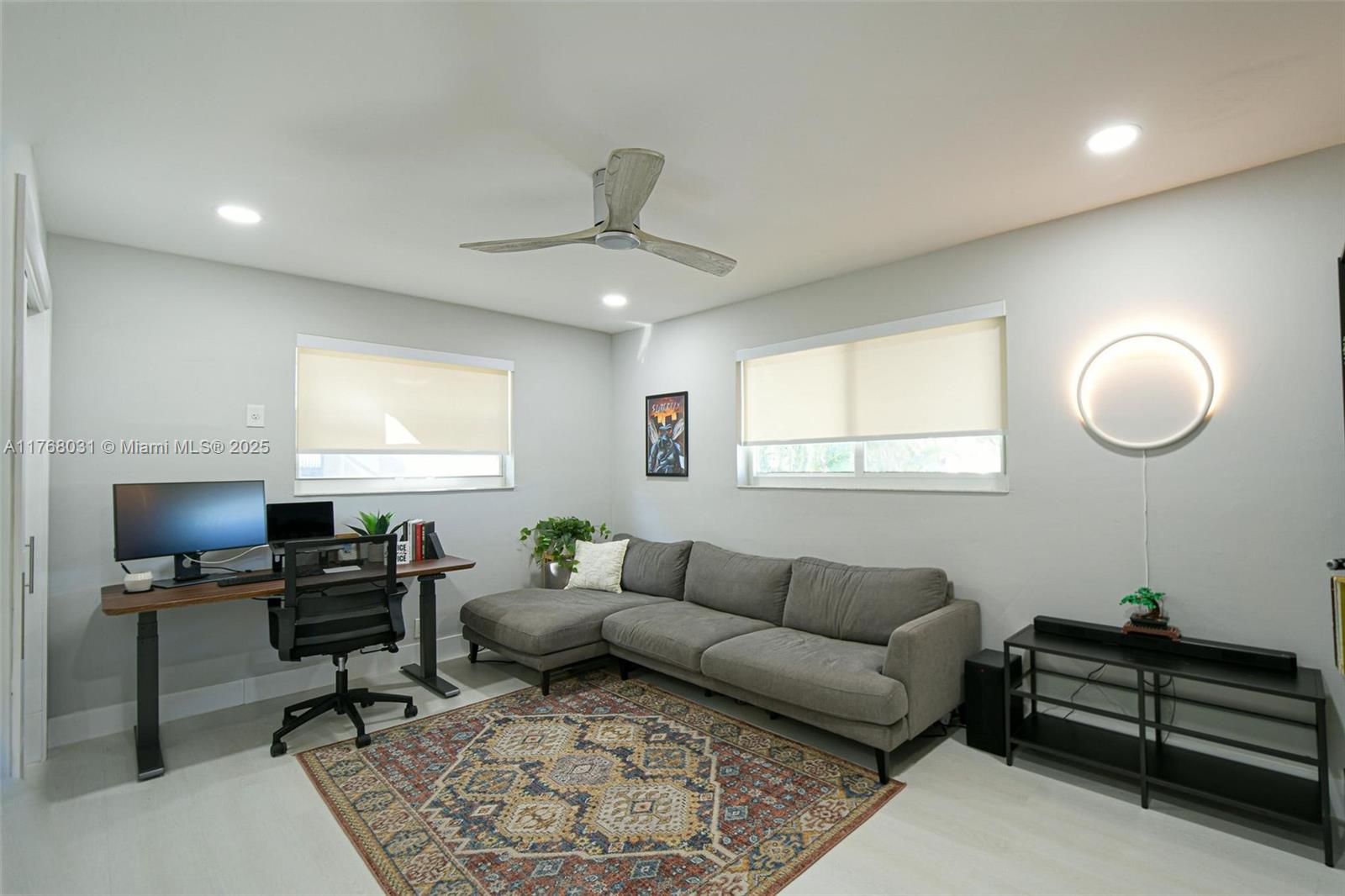 2001 North 31st Road Hollywood, FL 33021 - Photo 26 of 75 a living room with furniture a rug and a window