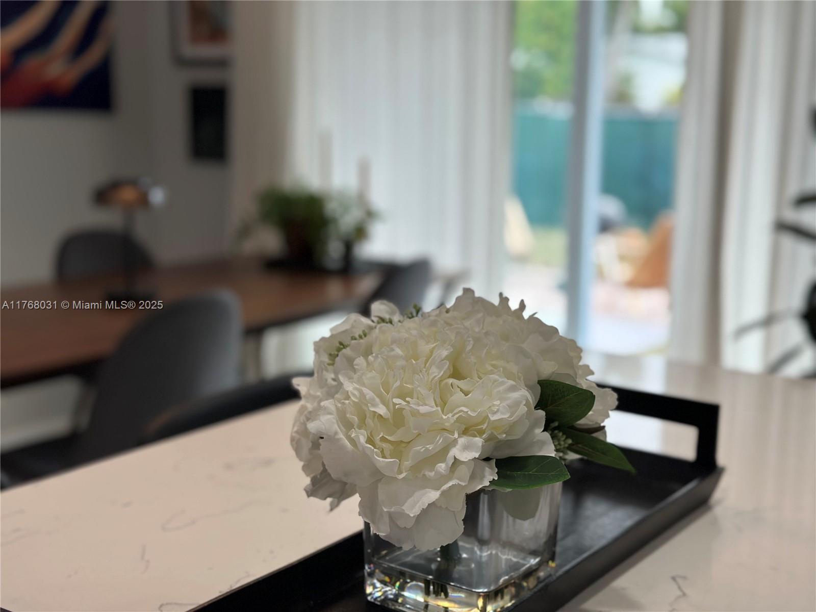 2001 North 31st Road Hollywood, FL 33021 - Photo 34 of 75 a vase of flowers sitting on a table