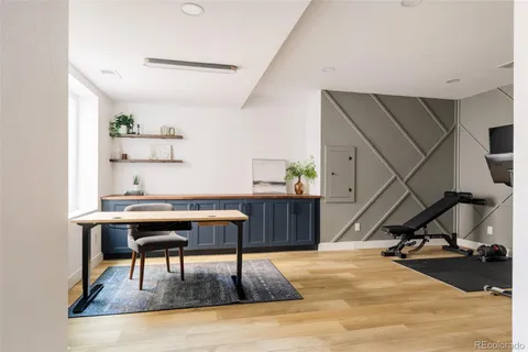 a view of a workspace with furniture