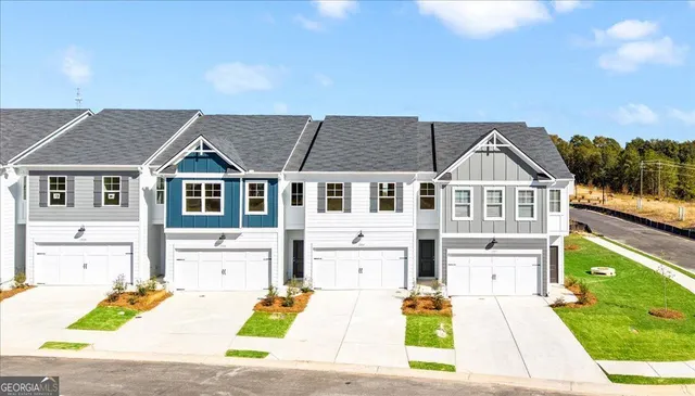 a view of house with yard