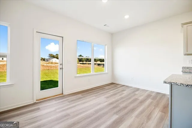 a view of an empty room and window