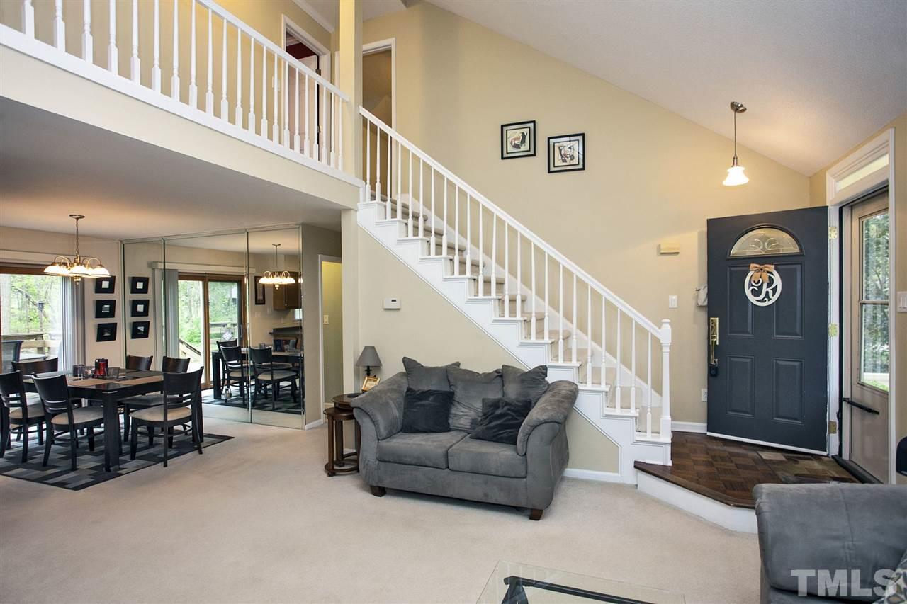 3665 Wickersham Way Raleigh, NC 27604 - Photo 4 of 25 This beautiful staircase and cat walk make for a grand entrance ...