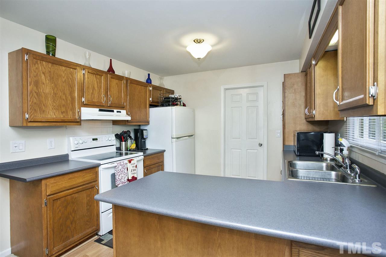 3665 Wickersham Way Raleigh, NC 27604 - Photo 7 of 25 Great work triangle in this Kitchen ... generous counter space ....