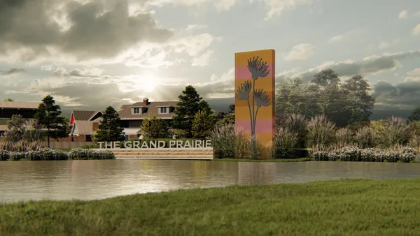 an aerial view of a house with outdoor space