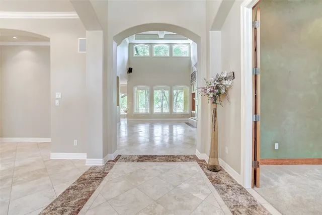 an empty room that has a window in it