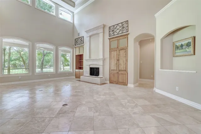 a kitchen with a sink center island and windows