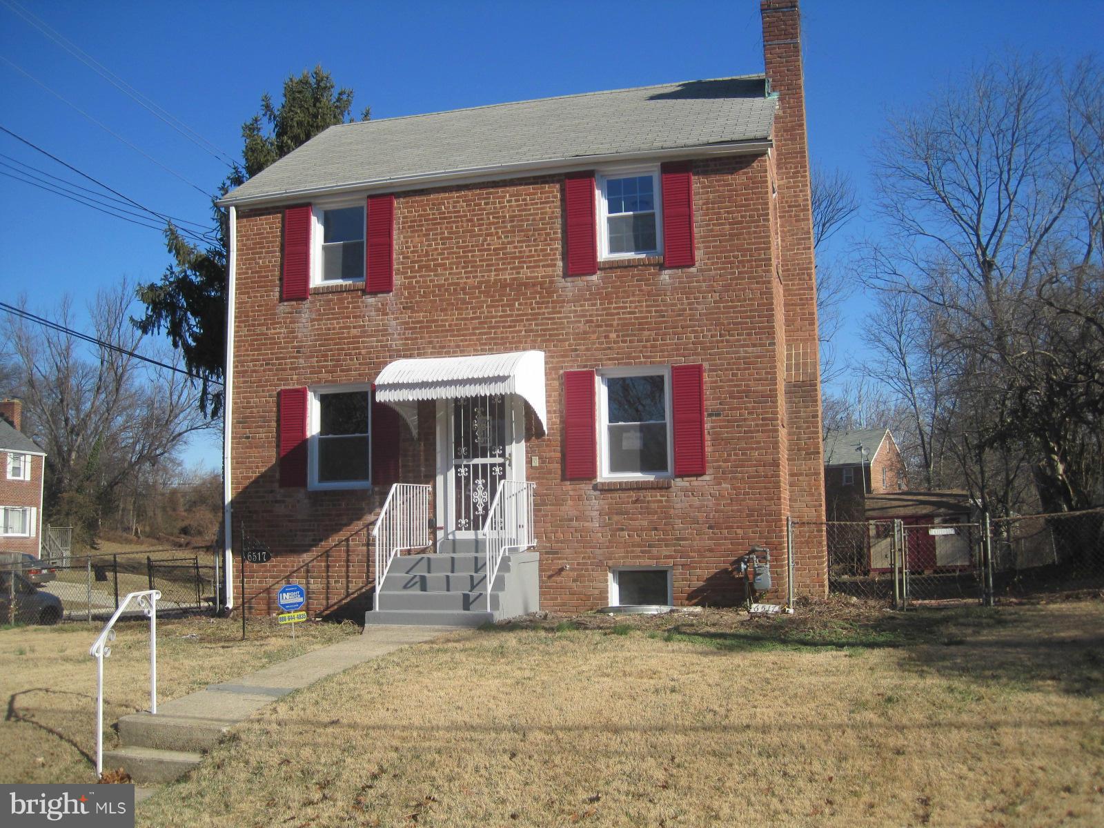 6517 Red Top Road Hyattsville, MD 20783 - Photo 1 of 23 a front view of a house with a yard