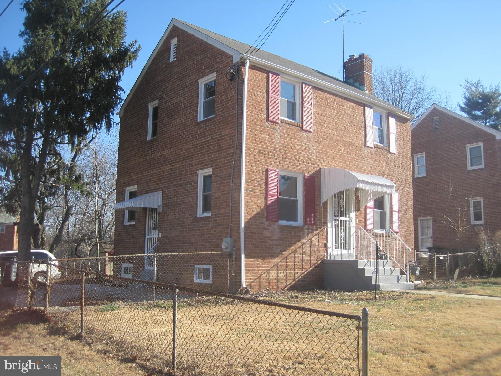 6517 Red Top Road Hyattsville, MD 20783 - Photo 2 of 23 a front view of a house with garden
