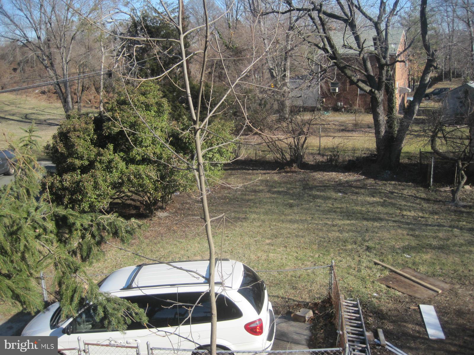 6517 Red Top Road Hyattsville, MD 20783 - Photo 3 of 23 a white building with a trees in the background
